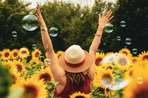 Photo by Andre Furtado: https://www.pexels.com/photo/woman-surrounded-by-sunflowers-1263986/