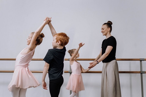 Photo by cottonbro: https://www.pexels.com/photo/photograph-of-kids-learning-ballet-6718450/