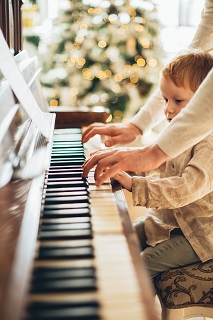 Photo by Elina Fairytale: https://www.pexels.com/photo/boy-in-white-long-sleeve-shirt-playing-piano-5859812/
