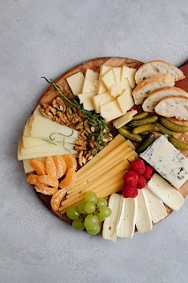 Photo by Karolina Grabowska: https://www.pexels.com/photo/a-charcuterie-board-with-cheese-and-fruits-6660056/
