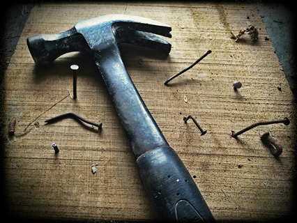 Photo by Pixabay: https://www.pexels.com/photo/black-claw-hammer-on-brown-wooden-plank-209235/