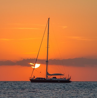 Photo by Riccardo: https://www.pexels.com/photo/sailboat-on-body-of-water-during-sunset-185799/